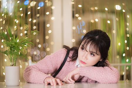 Woman With Her Hands On White Table thumbnail