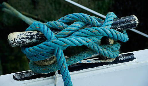blue rope wrapped on black metal rack thumbnail