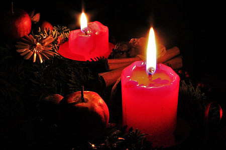 two lit red candles thumbnail