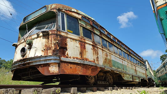 rusted white and gray train thumbnail
