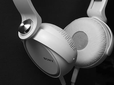 closeup photo of white corded Sony full size headphones thumbnail