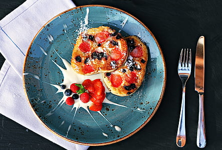 baked pizza on top of blue plate thumbnail