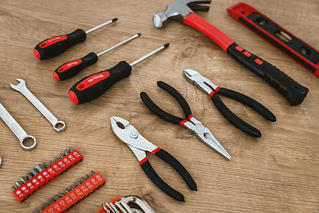 Construction tools on the wooden background. thumbnail