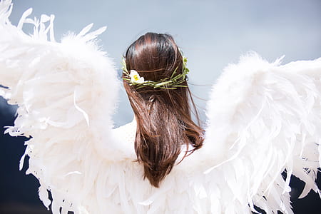 woman wearing angel wings thumbnail