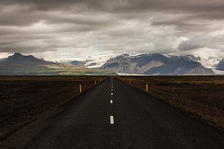 straight road with mountain ranges ahead thumbnail