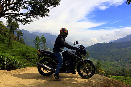 man riding a motorcycle thumbnail