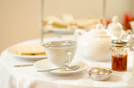white ceramic cup on saucer thumbnail