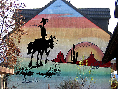 silhouette of man riding on horse thumbnail