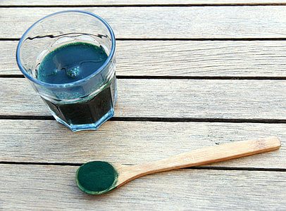 clear rock glass with green liquid thumbnail