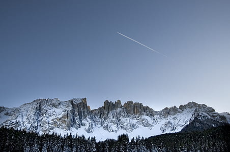 shooting star over mountain covered by snow thumbnail