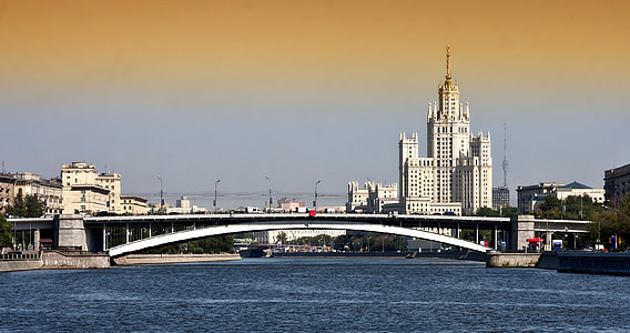 white bridge with white high-rise building background thumbnail