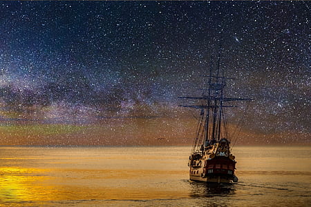 painting of ship with stars on night sky thumbnail