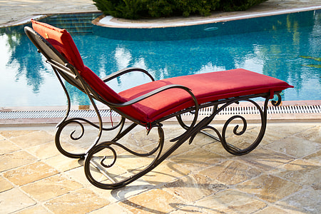 red lounger near swimming pool thumbnail