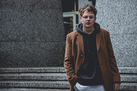 man in brown trench coat thumbnail