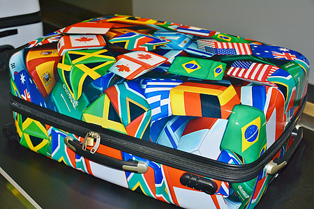 multicolored hardside luggage thumbnail