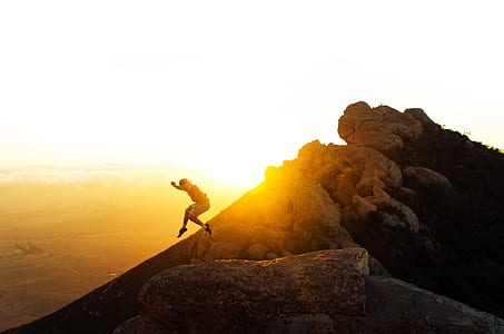 man jumped on top of the mountain thumbnail