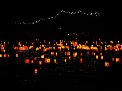 candles, lights serenade, river, festival of lights, floating candles, red thumbnail