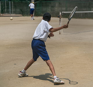 boy playing tennis thumbnail