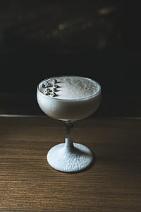 chiaroscuro photography of white footed glass thumbnail