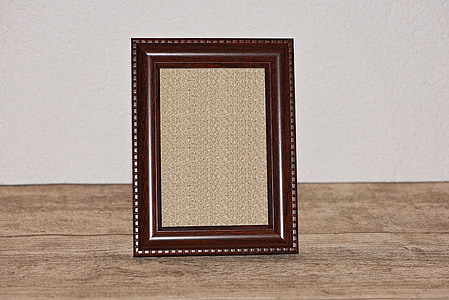 brown photo frame on brown surface thumbnail