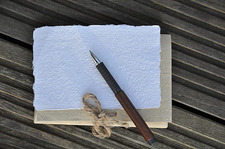 brown and black ballpoint pen thumbnail