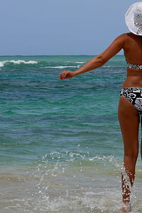 woman standing on sea shore thumbnail