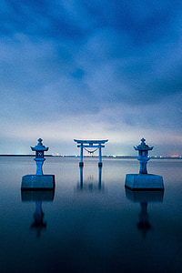 body of water and Tori under clouds thumbnail