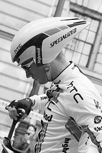 grayscale photo of man wearing helmet thumbnail