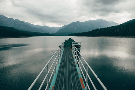 photography of teal and white metal dock thumbnail