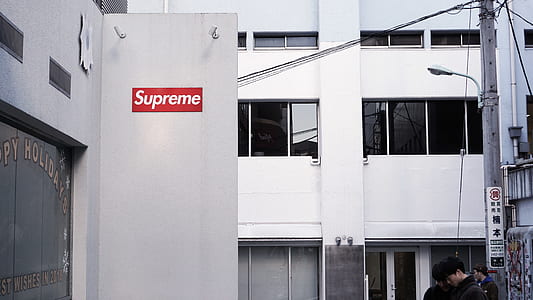 man standing in front of building thumbnail