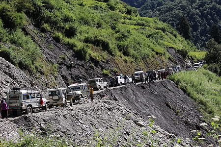 trail of gray SUVs thumbnail
