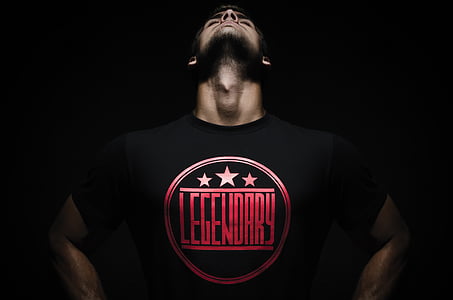 man in black and red Legendary-printed crew-neck shirt thumbnail