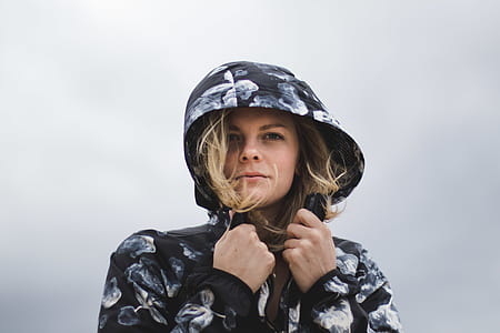 woman wearing black and white floral hoodie thumbnail