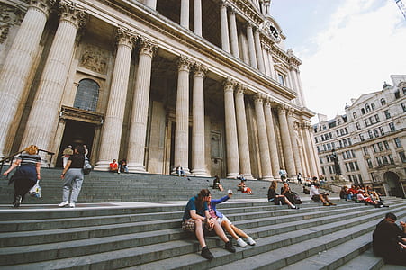 group of people sitting on stairs thumbnail