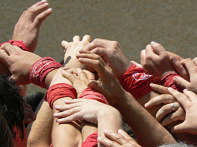 people holding hands together at daytime thumbnail