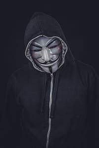 person wearing seafawk mask and black zip-up hoodie thumbnail