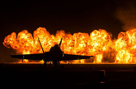 fighter jet near fire building thumbnail