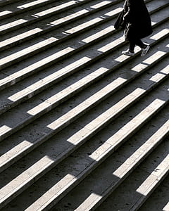 person walking on stair case thumbnail