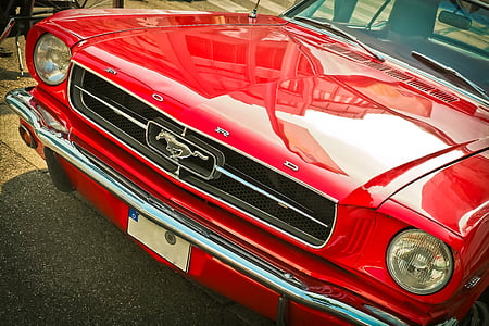 selective focus photo of red Ford Mustang coupe thumbnail