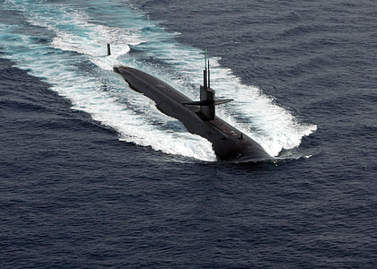 black submarine in body of water thumbnail