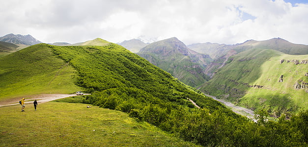 people on top of mountain thumbnail