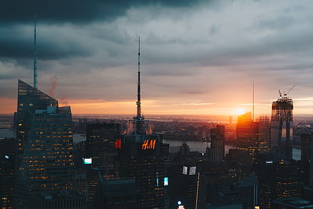 aerial photography of city buildings during sunset thumbnail