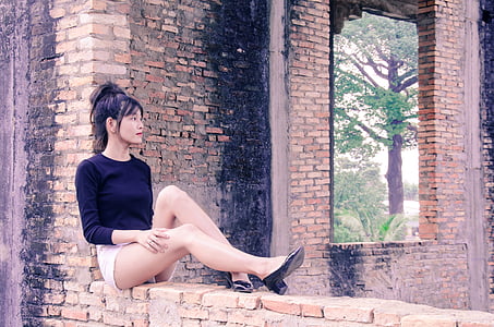 woman sitting on brick thumbnail