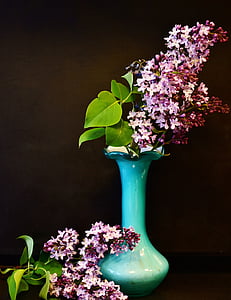 pink petaled flowers on green glass vase thumbnail