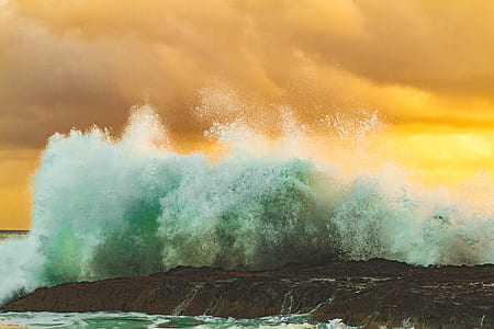 body of water waves under clouds thumbnail