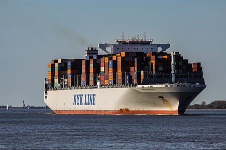 white cargo ship in body of water thumbnail