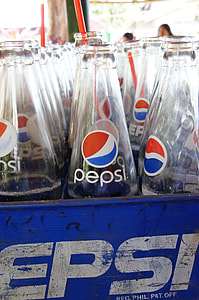 Pepsi glass bottle inside blue bottle crate thumbnail