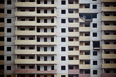 beige and white condominum thumbnail