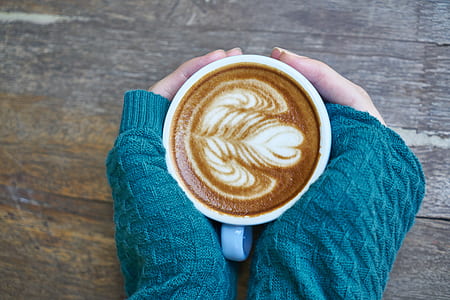 person holding cappuccino thumbnail