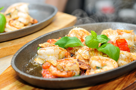 shrimps dish on grey metal tray close-up photography thumbnail